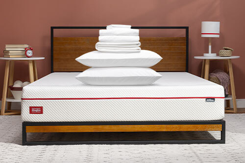 The Comfort Sleep Bundle products on a Douglas mattress