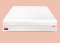 Front view of Douglas Summit mattress on a pink background