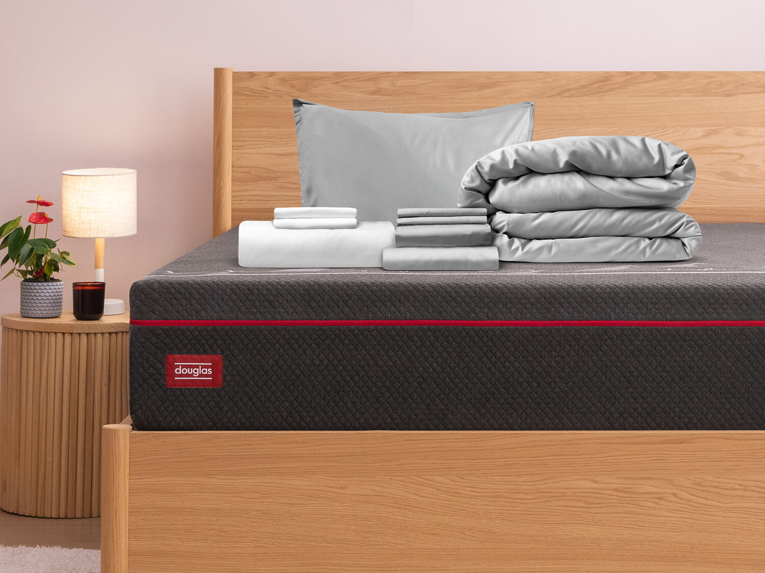 Premium Sleep Bundle + Duvet on top of a Douglas mattress