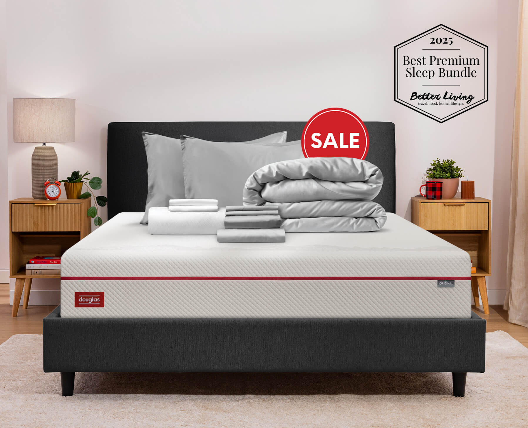 A grey premium sleep bundle sits neatly folded on a Douglas Original Mattress