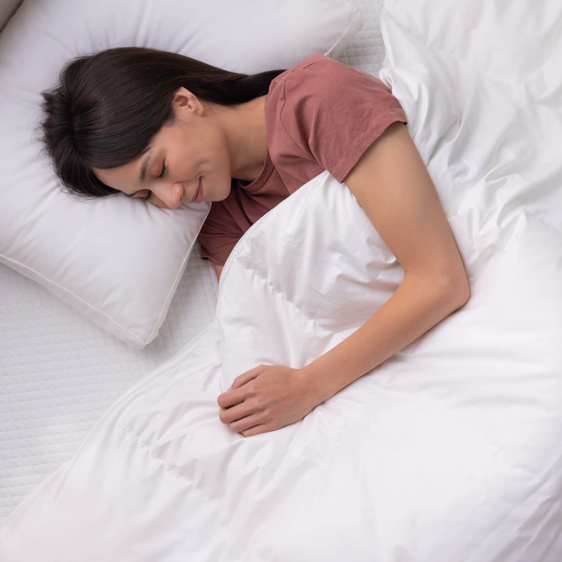 Douglas-DD-Carousel-20221011-v1.0DB-DD-Carousel-3 Woman in bed sleeping under Douglas Down Duvet