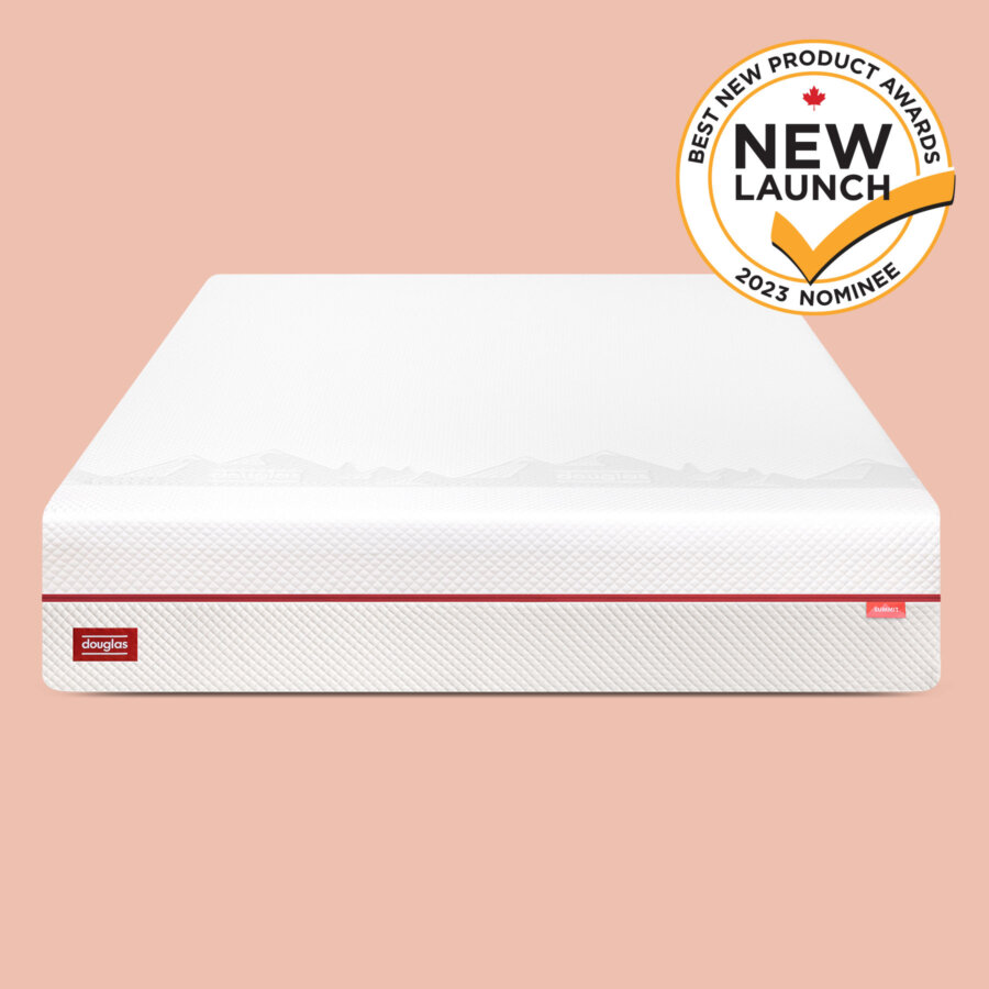 The front of the white and red Douglas Summit mattress against a pink backdrop, with Best New Product Award Nominee 2023 awards badge