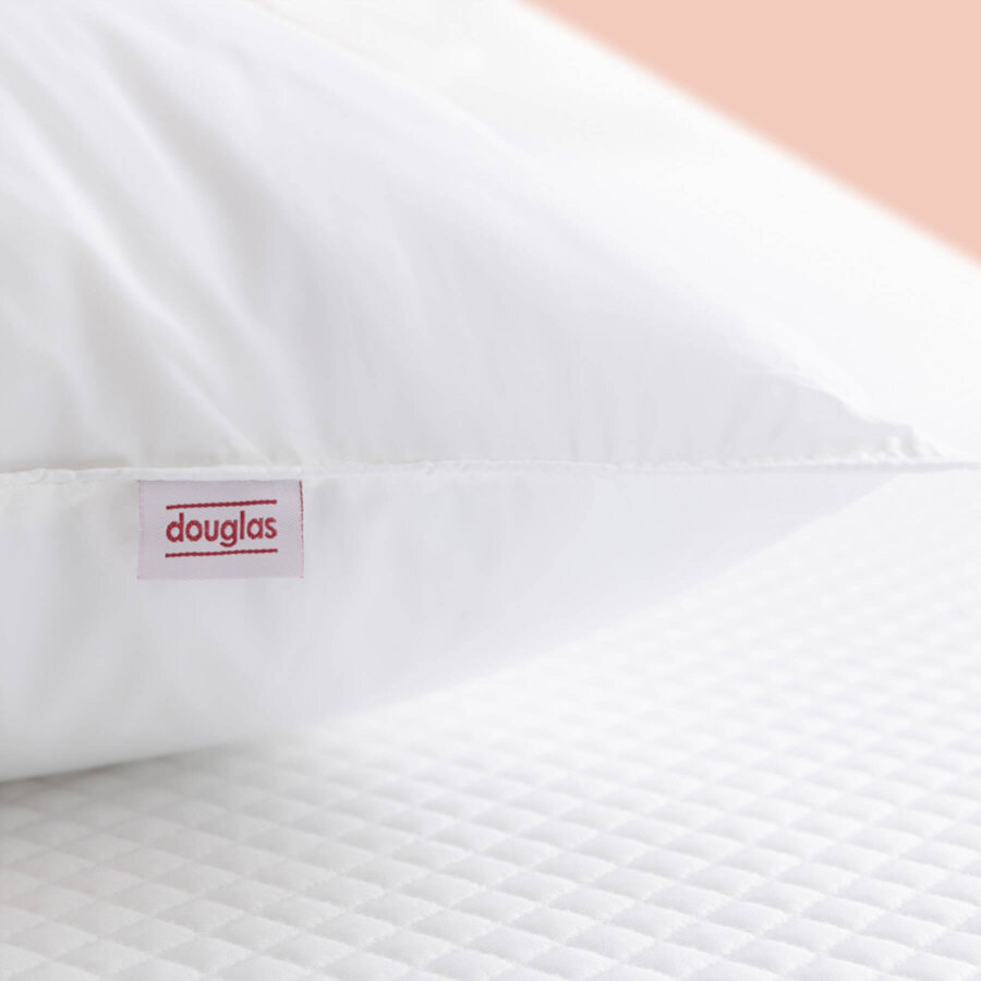 Closeup of the tag on the Douglas Down Alternative Pillow
