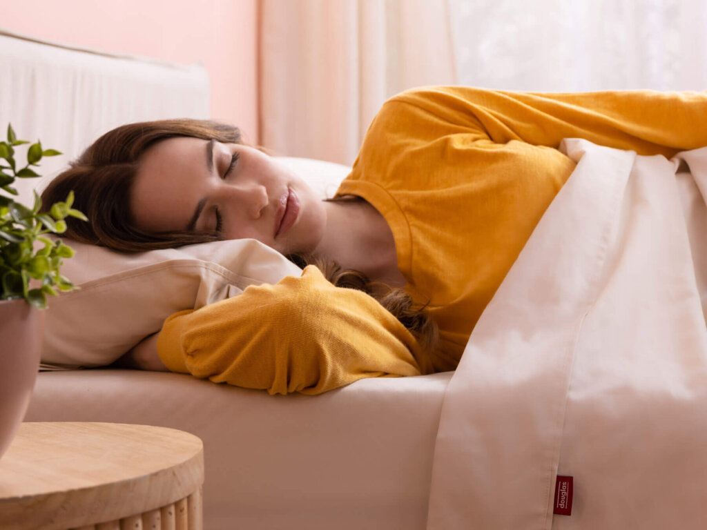 woman resting peacefully with her Douglas Egyptian Cotton Sheets