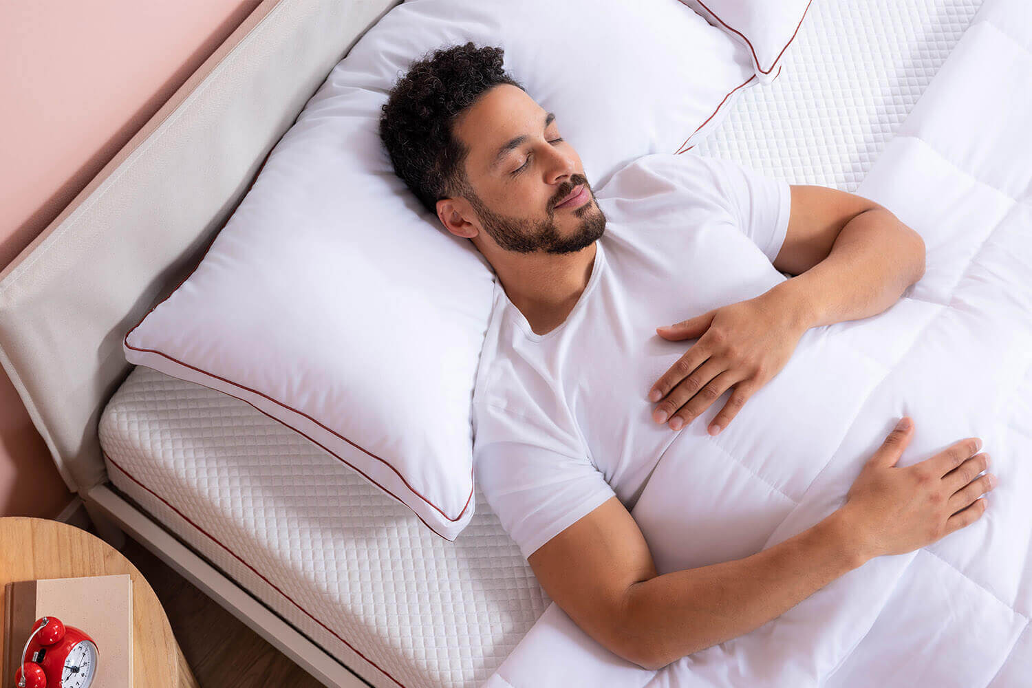 A man sleeping happily on a Douglas mattress